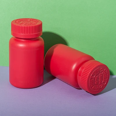 Bote rojo de HDPE de 120 ml para complementos alimenticios, SKU UKH003