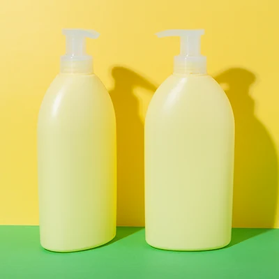 Botella amarilla para champú de HDPE, 700 ml