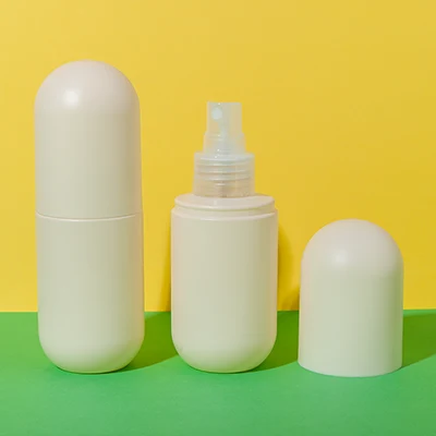 Botella compacta con pulverizador para productos capilares de PET, 100 ml