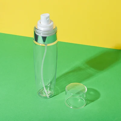 Botella transparente con pulverizador para productos capilares de PET, 120 ml