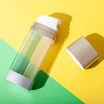 Envase airless de doble cámara con bomba de salida única Envase airless de doble cámara con bomba de salida única