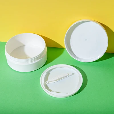 Tarro plano para discos tónicos de 200 ml con pinzas