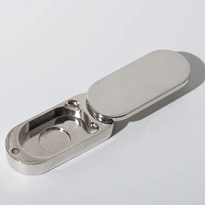 envase ovalado de metal para perfume sólido con tapa magnética