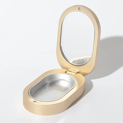 estuche ovalado para perfume sólido con espejo