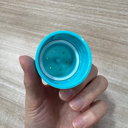 Salidas internas para controlar el flujo de polvo Sweeq