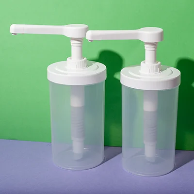 Bomba dosificadora de salsas con envase de PP de 1000 ml – imagen de producto