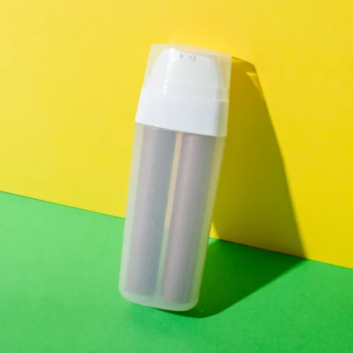 Botella cosmética airless con bomba de doble cámara de PP de 15+15 ml - imagen 1