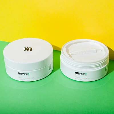 Tarro cosmético plano de PP de 200 ml con pinza de plástico
