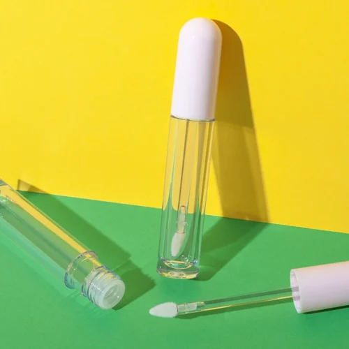 Tubo transparente de brillo labial con tapón rosa de 5 ml – imagen 1